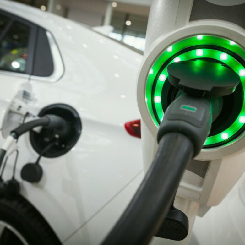 A close up of an electric car charging