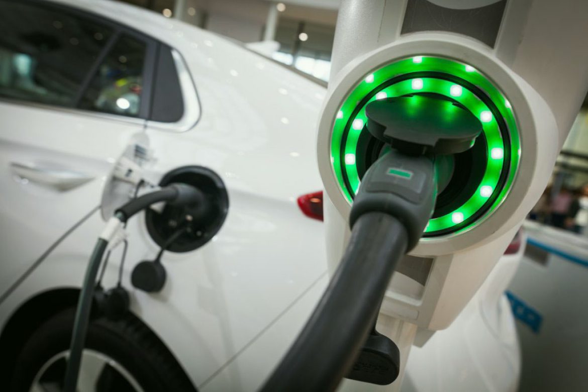 A close up of an electric car charging