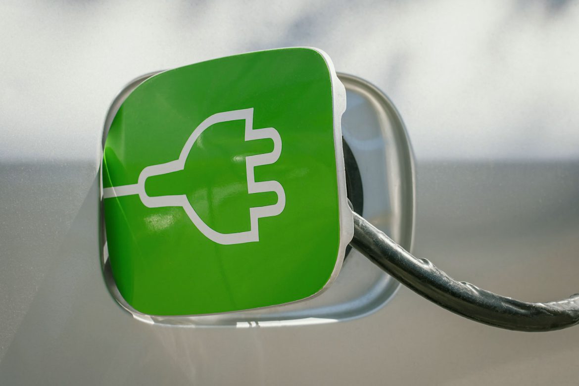 A close up of an electric car charging