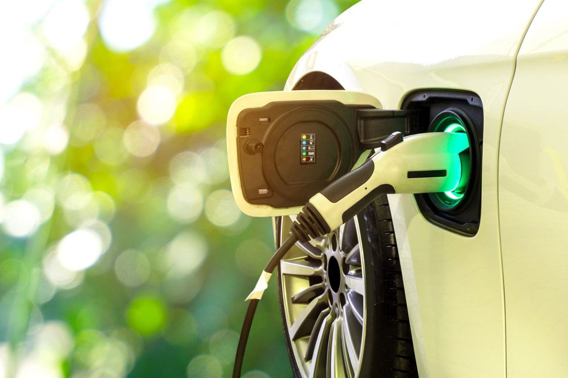 A close up of an electric car charging